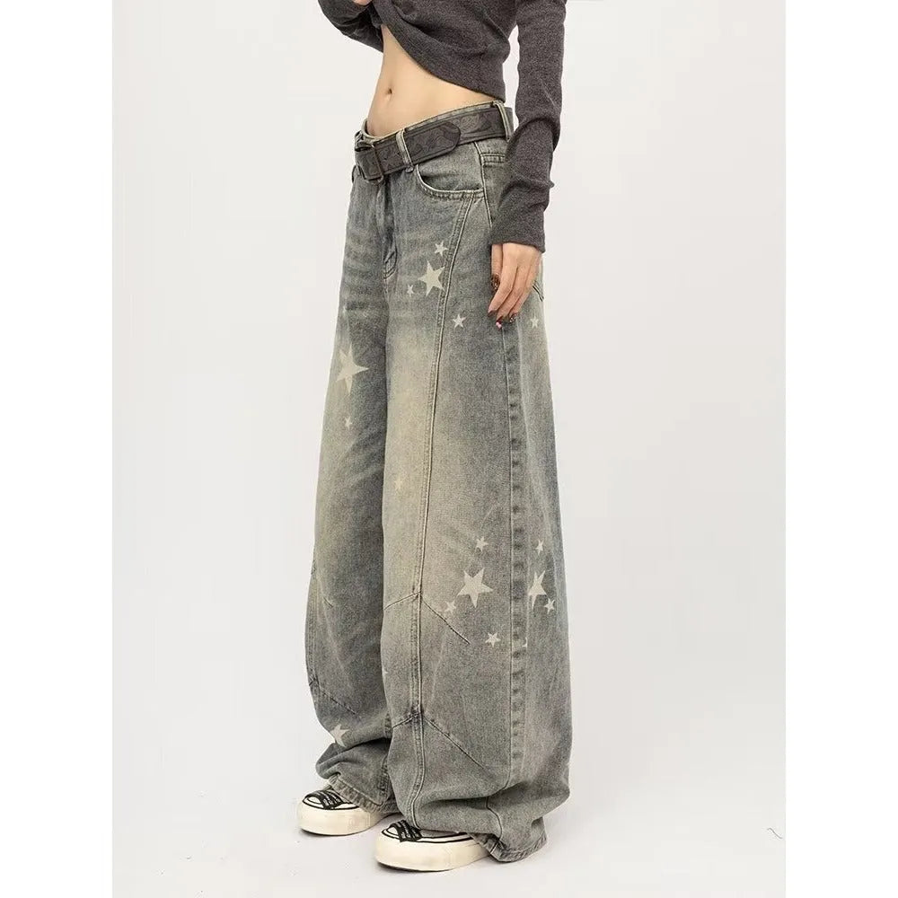 Men's blue loose fit jeans with vintage washed, distressed and grey splatter finish, mid-rise waist and long pant length.