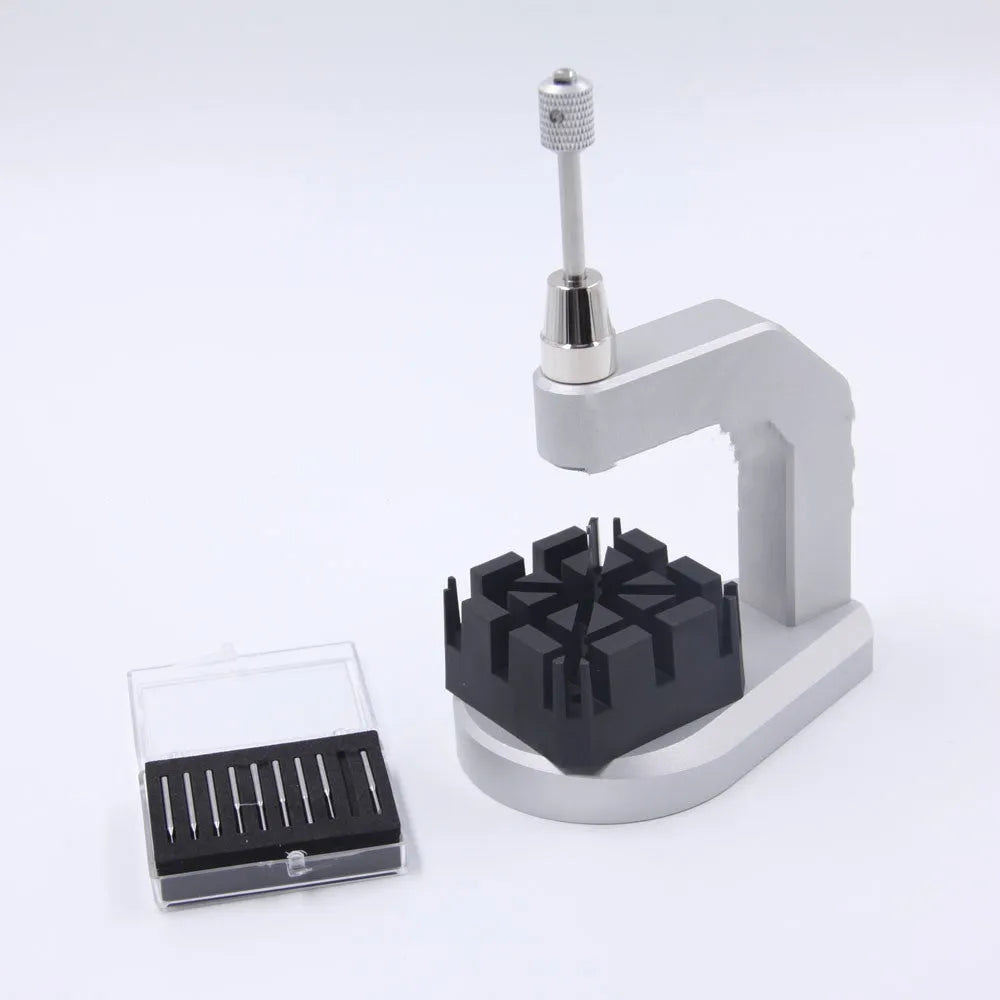 Silver tool steel press strap removal tool for watches, jewellery, and electronics.