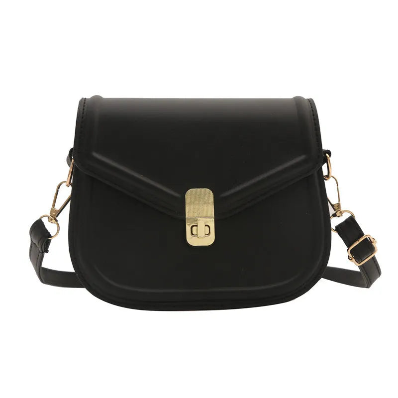 Soft PU leather shoulder messenger bag with clamshell opening in khaki colour, shown from the front.