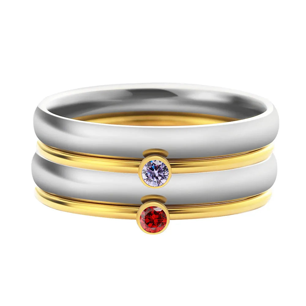 December birthstone geometric engraved ring in titanium steel on a hand.