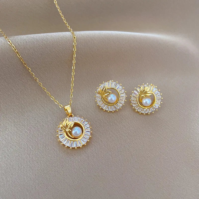 Women's titanium steel jewellery set with square diamond design necklace and matching stud earrings