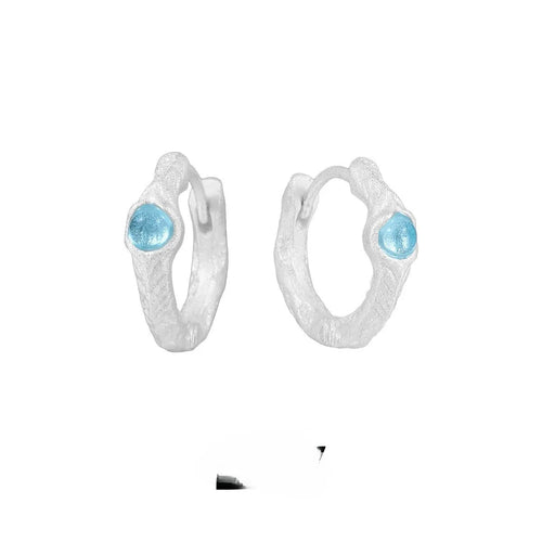 925 sterling silver geometric ear clip with burnt silver electroplated finish and round design elements.