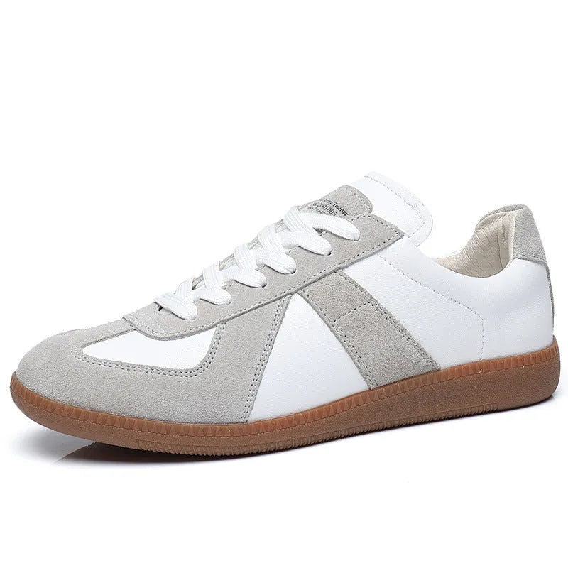White Japanese-style retro low-top sneakers with matte upper and lace-up front