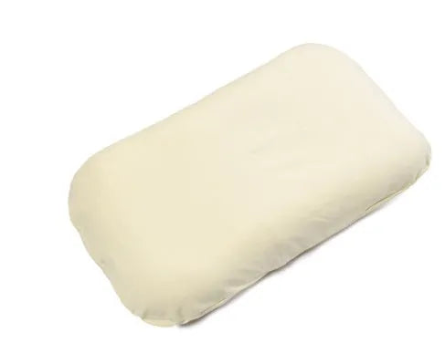 Beige portable cotton baby nest crib for newborns on a neutral background