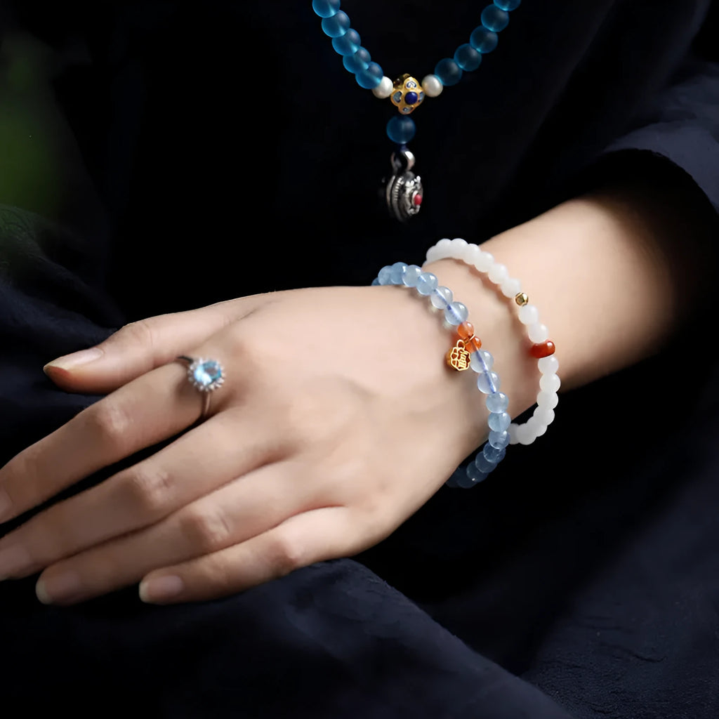 Women's natural crystal bracelet with 8mm ice translucent round beads and sequin accents