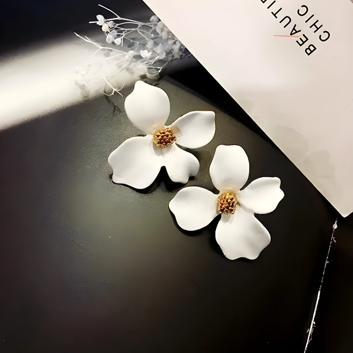 Flower design stud earrings for women in white or pink electroplated finish
