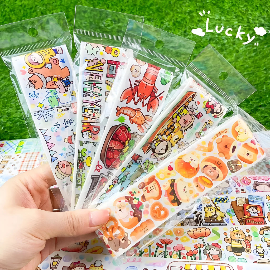 Sheet of colourful cartoon character stickers on Japanese paper for gift wrapping and craft decoration.