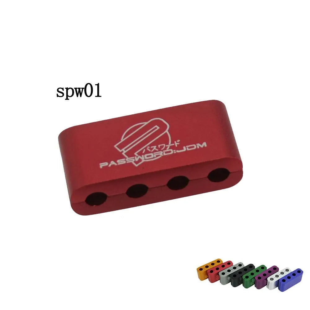 Three-piece metal car modification fastening clamp in assorted colours on a white background.