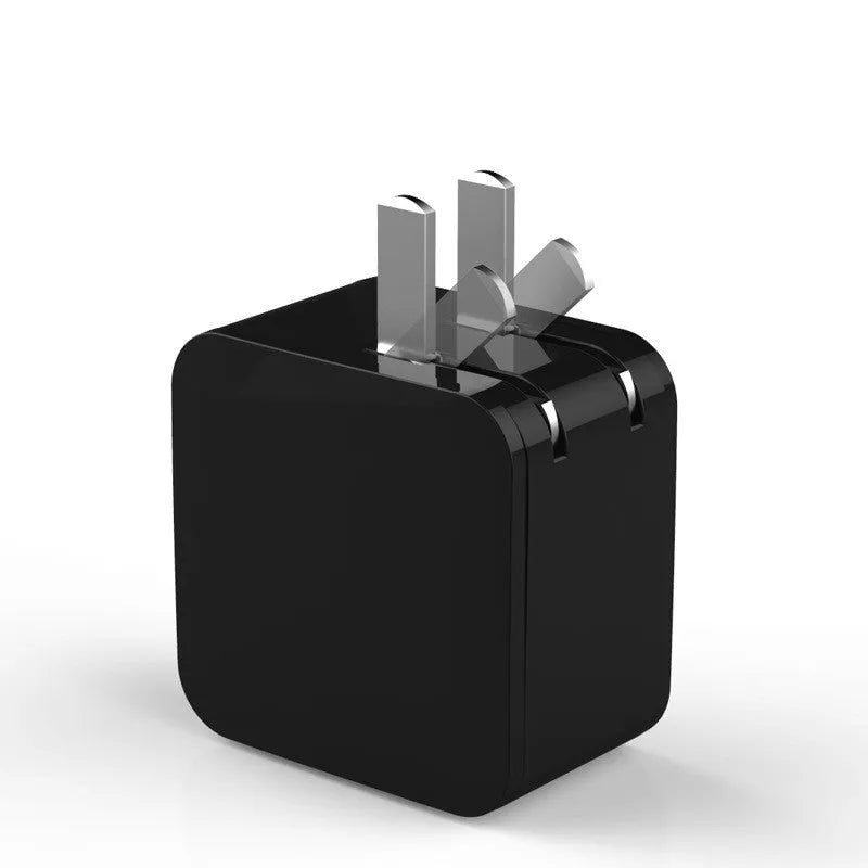 Black dual USB fast travel charger with digital display showing charging status and EU standard plug.