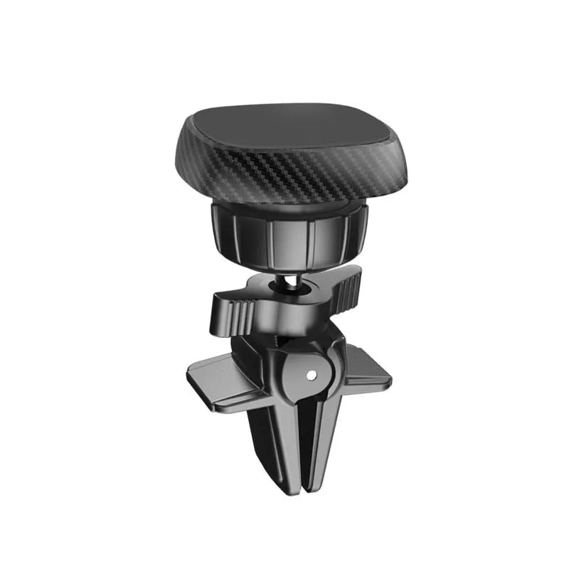 Black magnetic car phone holder attached to vehicle air vent with mobile phone mounted