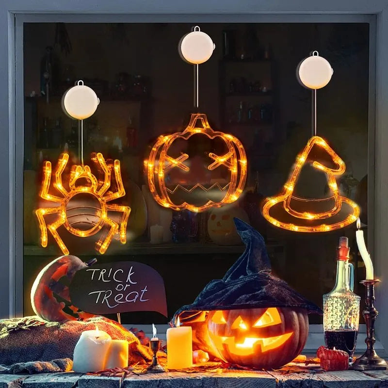 Halloween window hanging LED lights with spider and pumpkin decorations creating horror atmosphere lighting