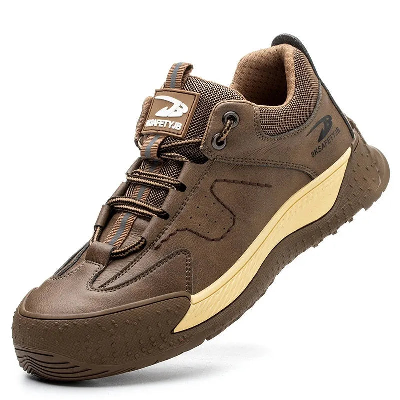 Flyknit work safety shoe with leather upper and rubber sole shown in black colour.