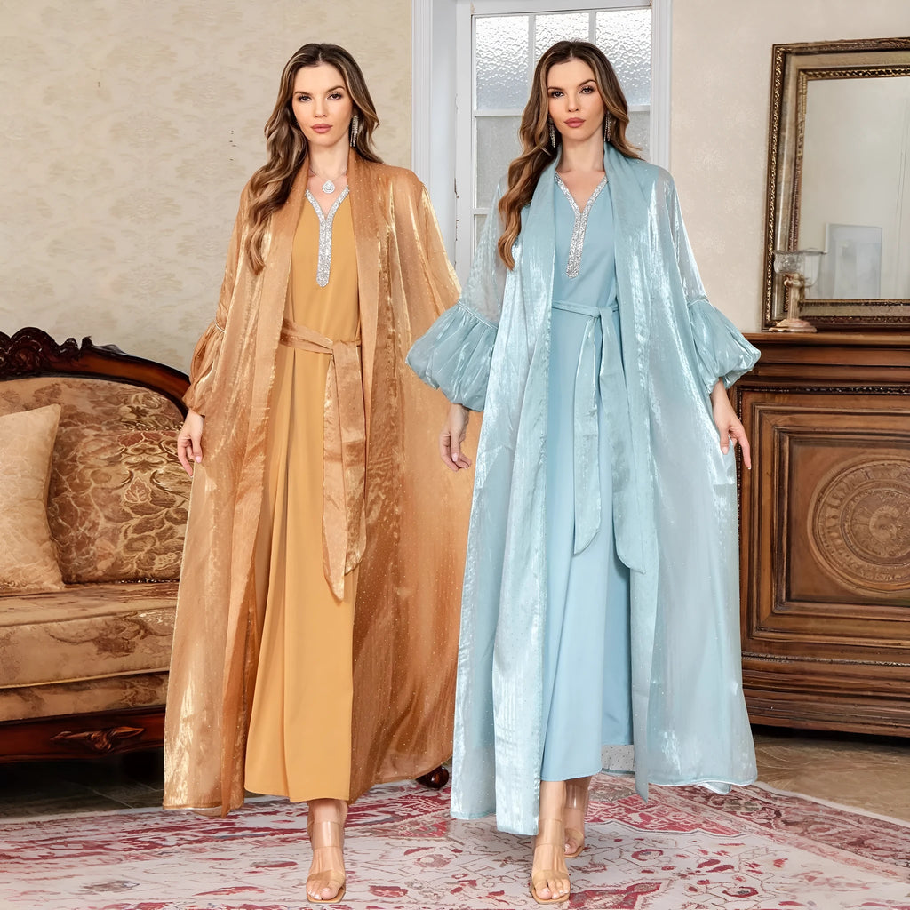 Blue Arabic style two-piece evening dress with rhinestone detail and long sleeves