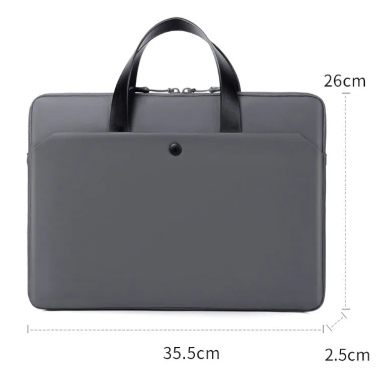 Ultra-thin leather laptop case in light gray with zipper closure and soft handle for 15.6-inch laptop