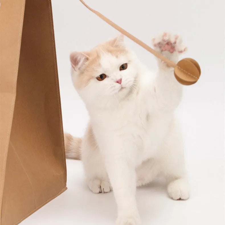 Brown washable kraft paper cat nest with integrated scratch board measuring 40cm by 30cm by 53cm