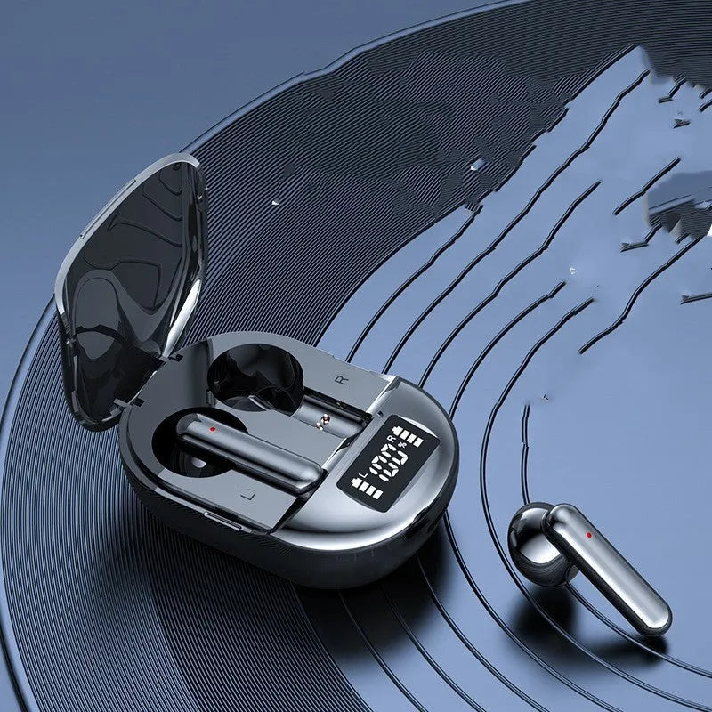 Black and white wireless Bluetooth in-ear headphones with a charging case on display.