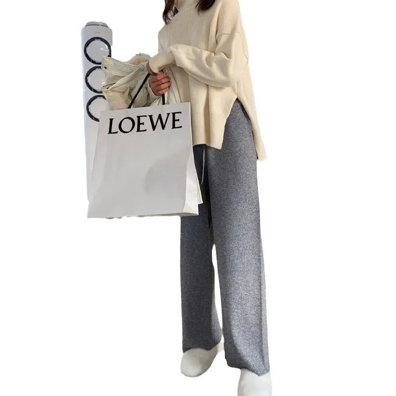 Women's knitted wide-leg trousers in black with high waist and straight leg design