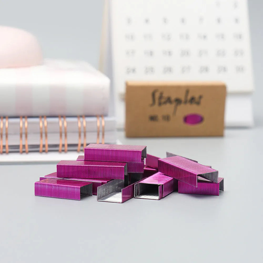 Box of 1000 metal staples in rose gold, black, purple, and rose red colours for office staplers