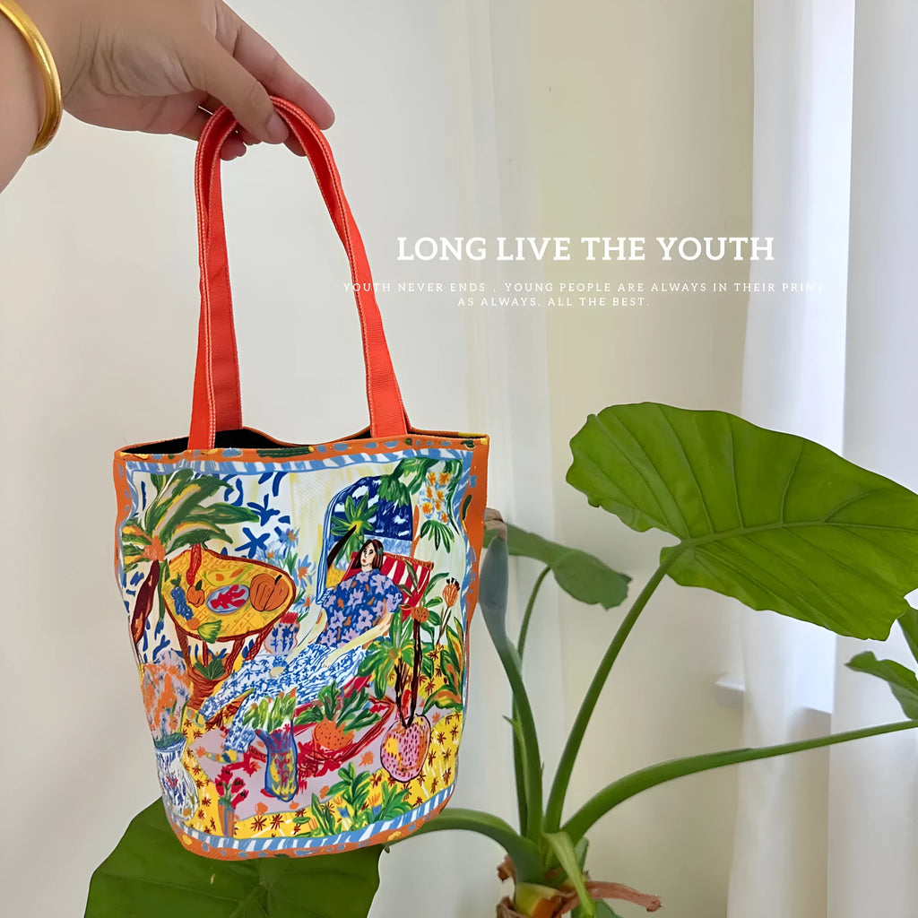 Thailand artistic bucket bag in Dream Garden orange plush with double straps and canvas lining