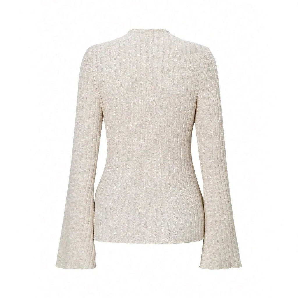 Black long sleeve slim fit top with lantern sleeves and a sunken stripe pattern