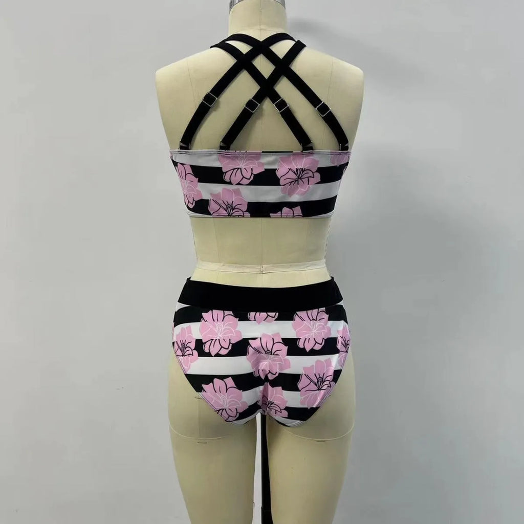 Black women's bikini with covered belly and split style for swimming.