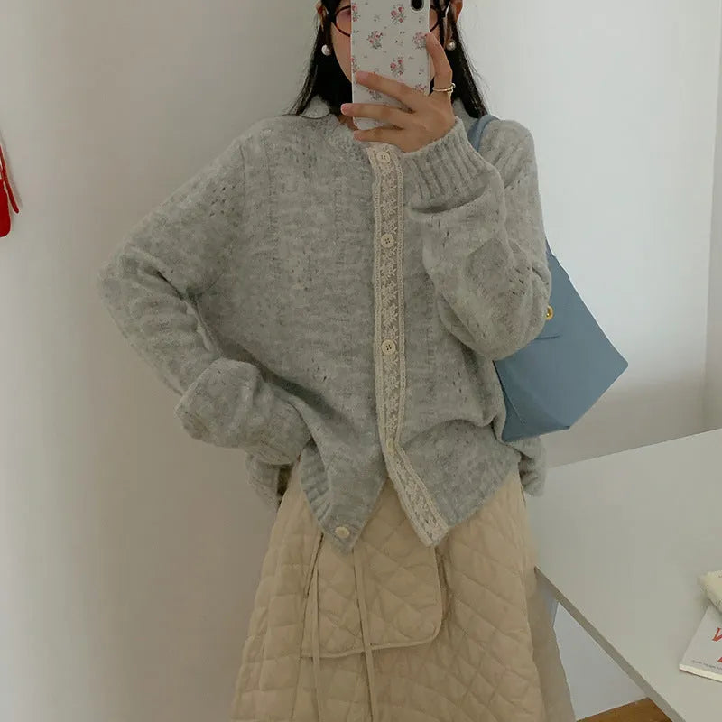 Artistic retro loose-fit viscose knitwear cardigan coat in apricot, shown open.