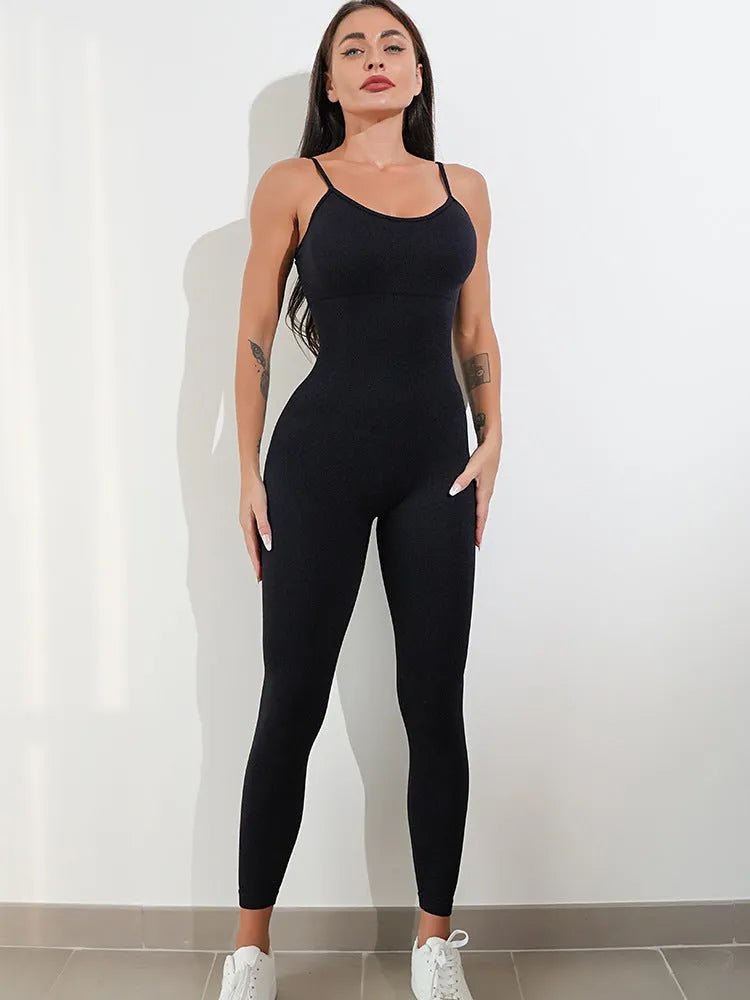 Women's black sleeveless jumpsuit with spaghetti straps and a fitted silhouette.