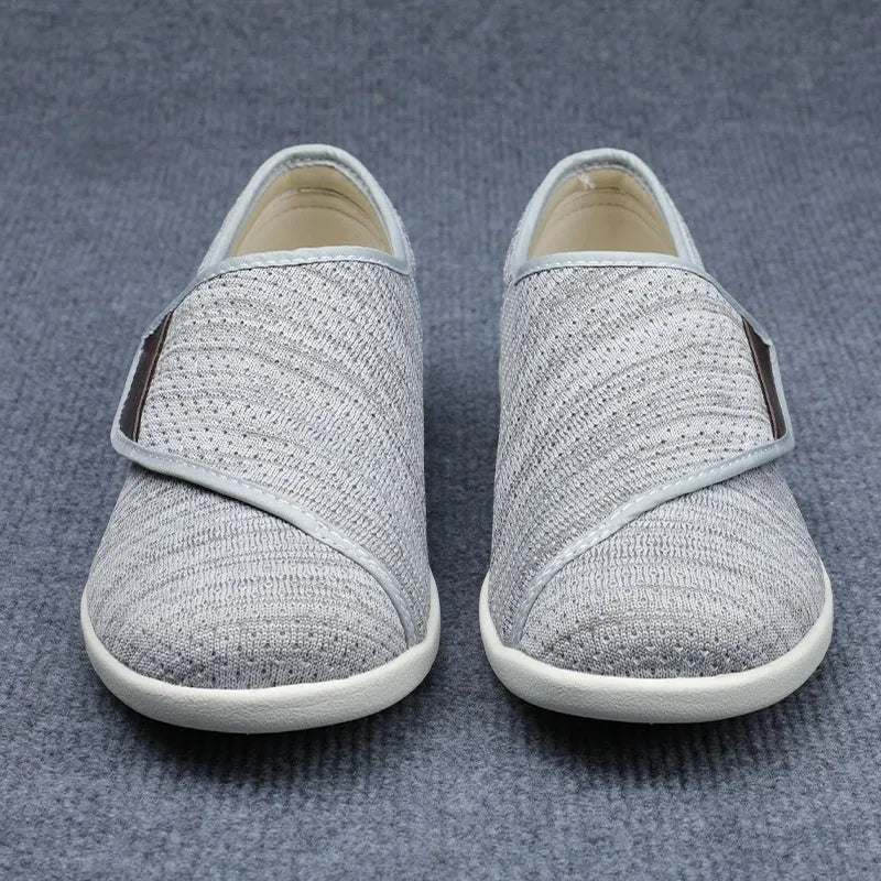 Beige leisure mother shoes for elderly with widening design and Velcro fastening on a rubber foam sole