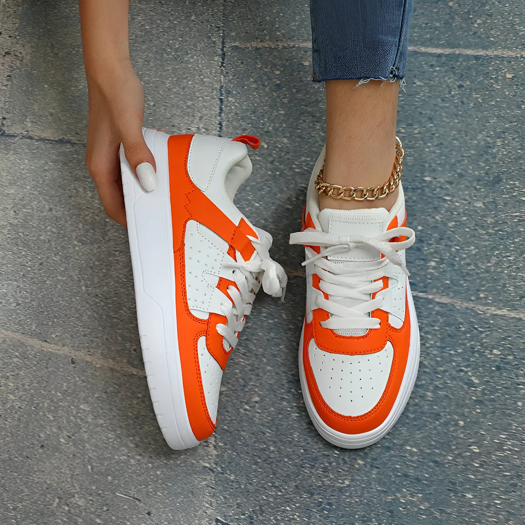Couple platform sneakers with white upper, round toe, and EVA sole with lace-up closure.