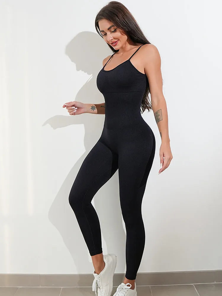Women's black sleeveless jumpsuit with spaghetti straps and a fitted silhouette.