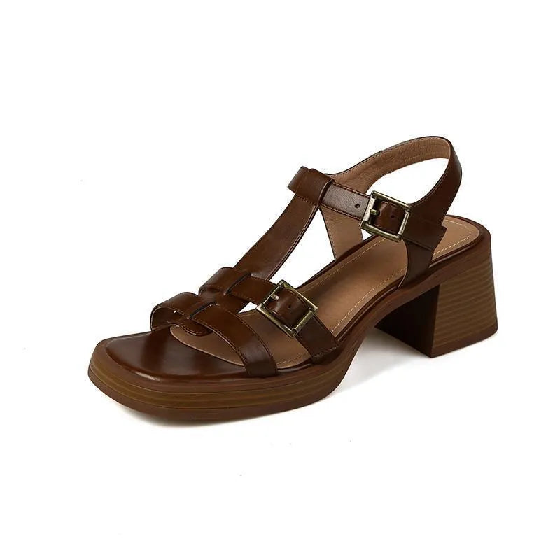 Women's black retro high heel sandals with a T-shaped buckle and chunky platform sole.