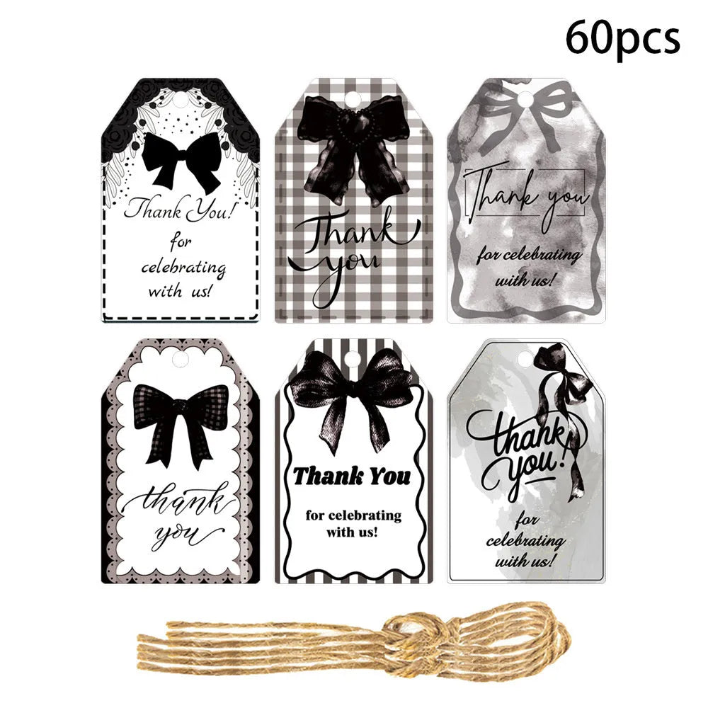 Set of 60 paper birthday gift tags with bowknot designs and natural hemp rope in three decorative styles
