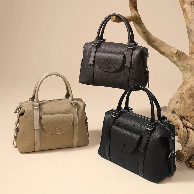 Genuine leather women's handbag in black, brown, or elephant grey with contrast stitching.