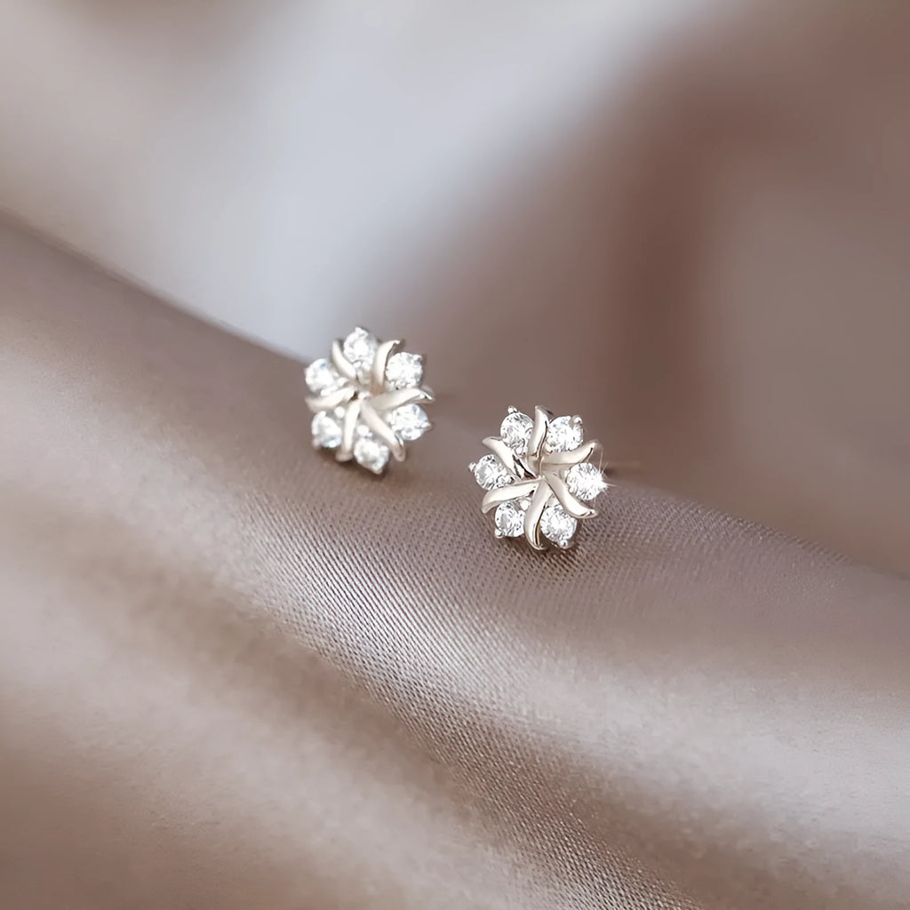 Snowflake ear stud earrings for women, copper electroplated silver colour, geometric zircon design