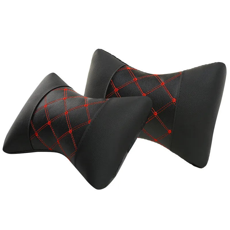 Black quilted car headrest cushion with diamond pattern for neck support.