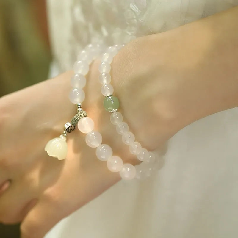 S925 silver bracelet with white agate and Hetian jade stones showing lotus geometric design