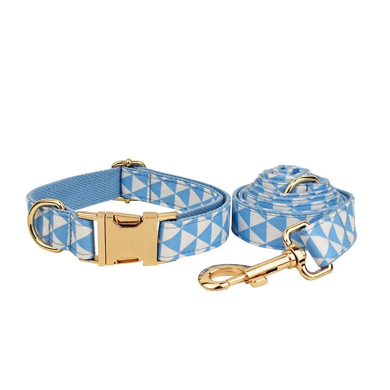 Blue four-piece dog set with collar, leash, bow, and vest in cloth material