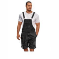 Man wearing dark blue ripped denim shorts with black suspenders, casual leisure style