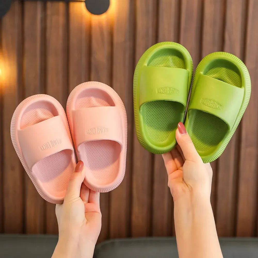 Colourful children's EVA slippers with a non-slip sole, shown in mixed colours on a white background.