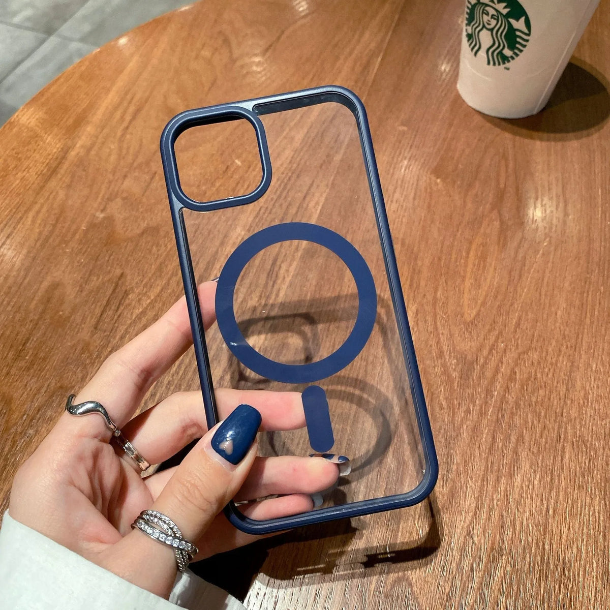 Transparent acrylic MagSafe phone case showing magnetic ring, compatible with iPhone 12 and 13 models