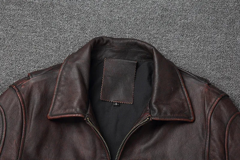 Men's short motorcycle leather coat in reddish brown with stonewashed distressed finish, front view