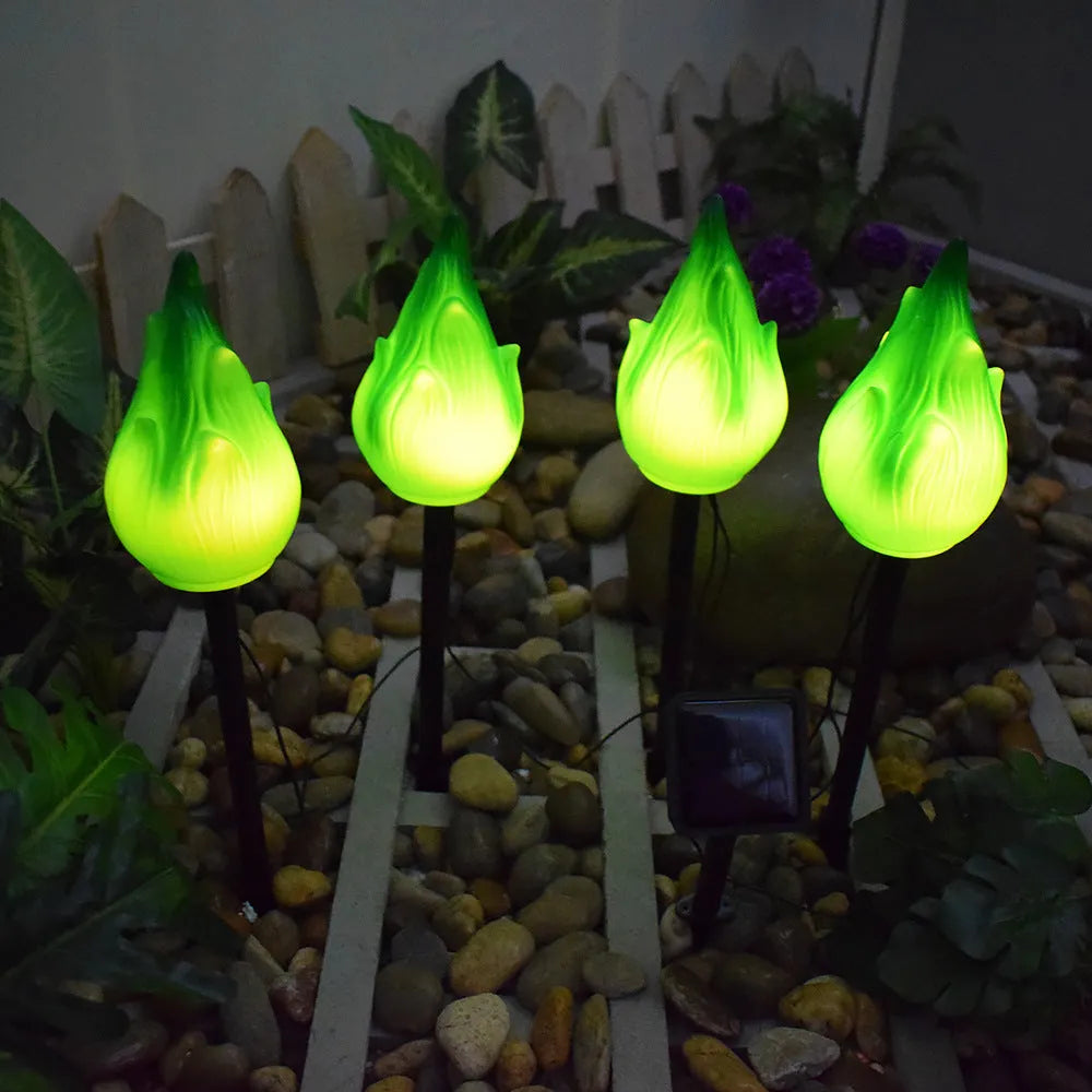 Solar simulation flame lamp with wrought iron frame and yellow flame effect in garden courtyard