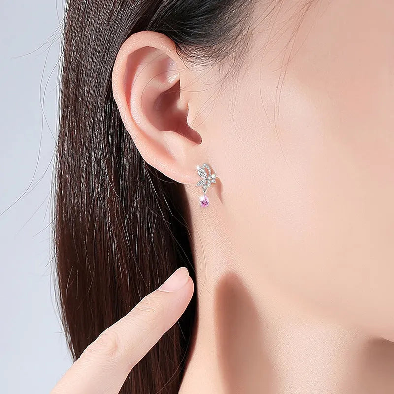 Silver butterfly stud earrings with crystal accents on 925 silver posts