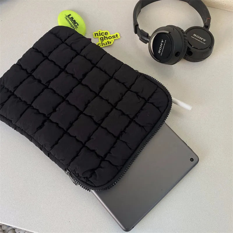 Large capacity laptop bag in black or white with durable nylon exterior and cloud cotton interior