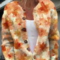 Yellow digital print cardigan coat with 3D pattern effect, shown as an open layer.