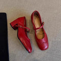 Pair of women's square toe high heel pumps with short stout heel, microfiber upper and rubber sole, in black, red or apricot