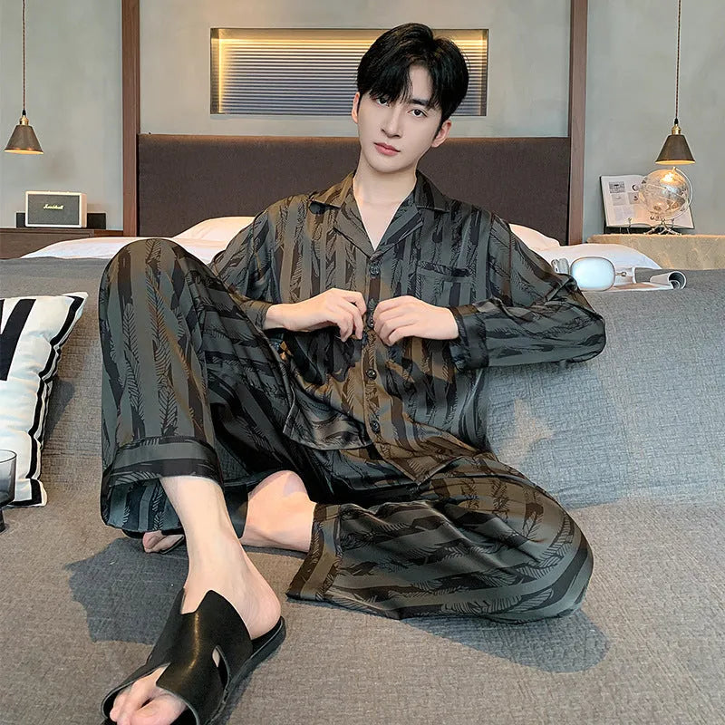 Men's black striped ice silk V-neck pyjama set with long sleeves and trousers.