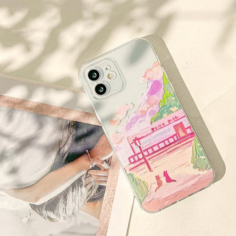 Soft silicone iPhone case with a colourful two cat cartoon design on the back.
