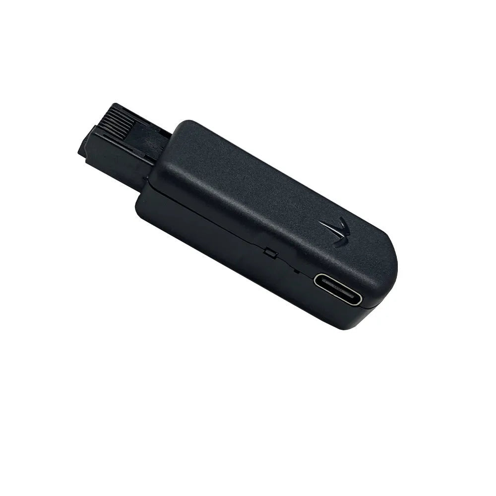 Black JB Tool USB adapter with aluminum alloy construction for PlayStation firmware management.