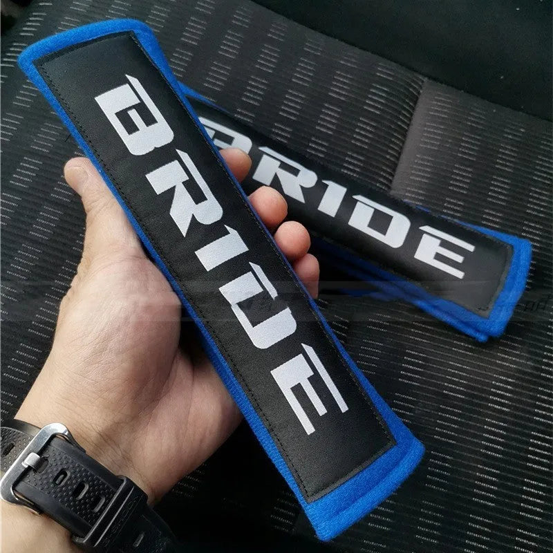 Car seat belt shoulder pad set in black blue red colours with embroidery on cotton sponge cloth